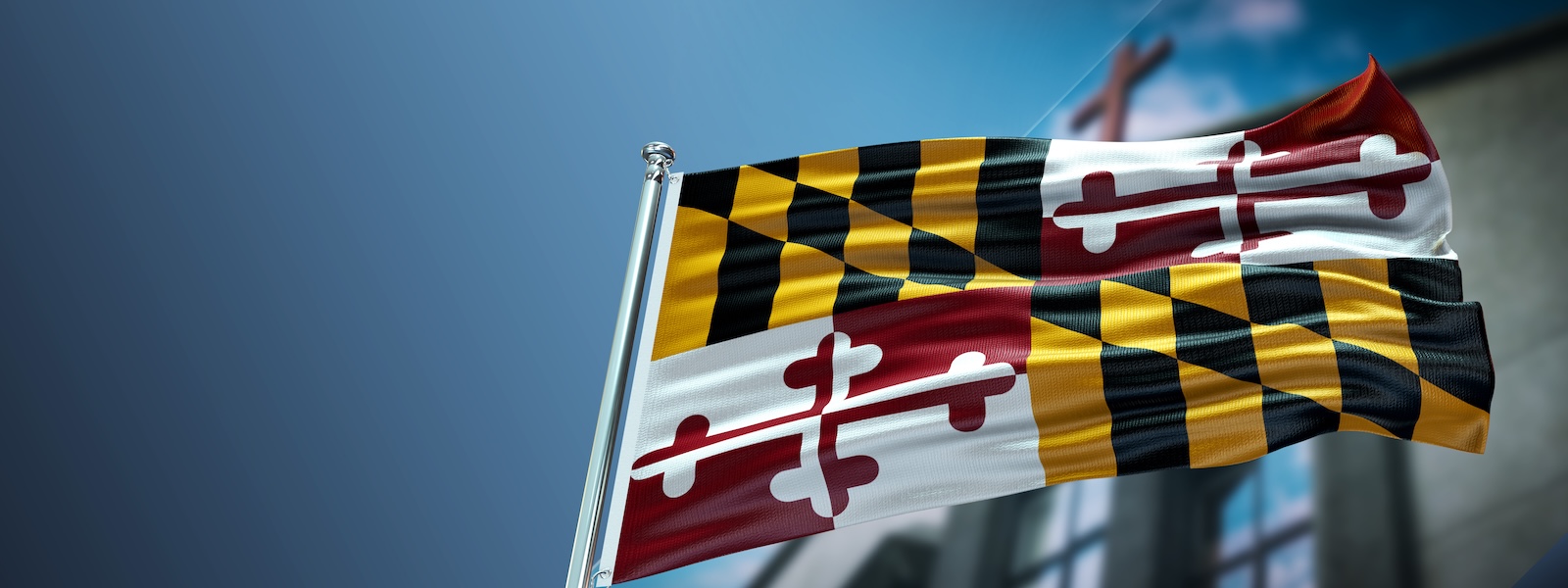 maryland flag with cross in the background