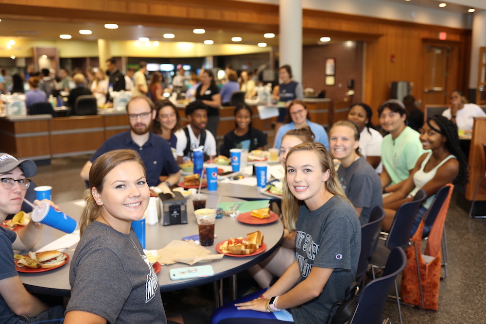 students in patriot hall during lunch